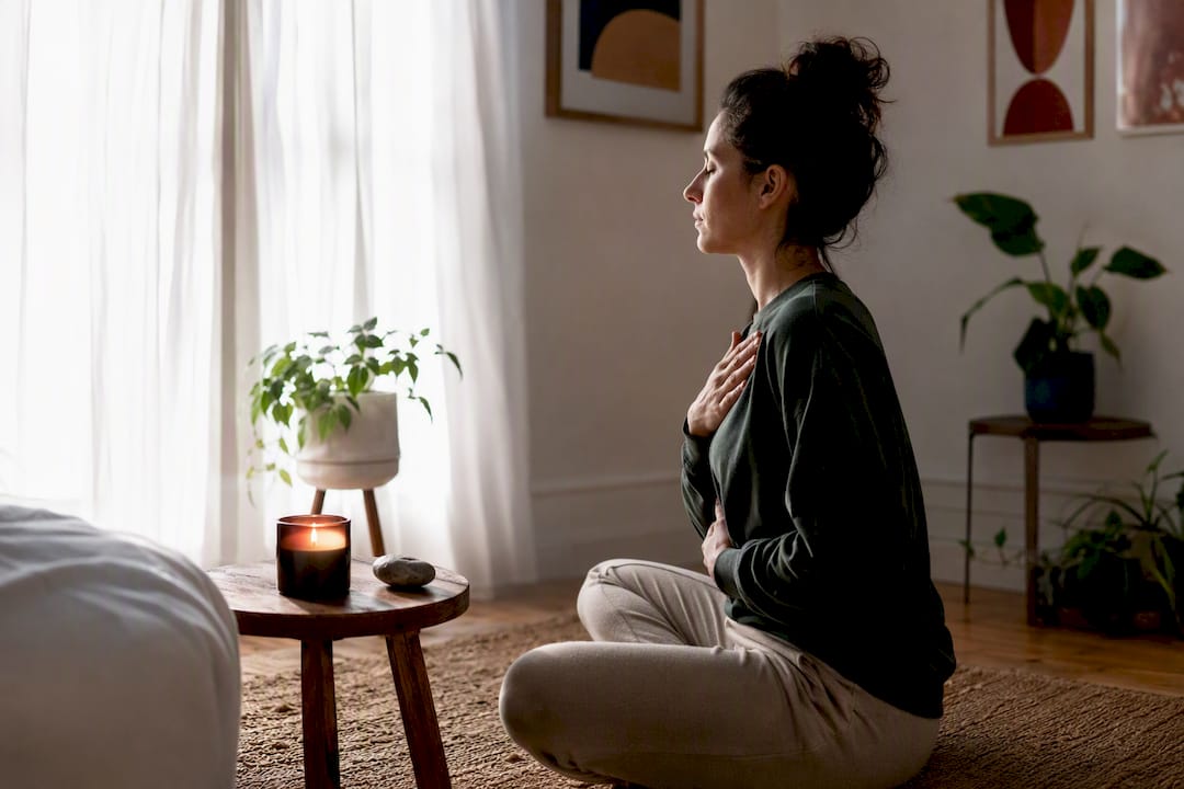 Person doing simple breathing exercise at home nook