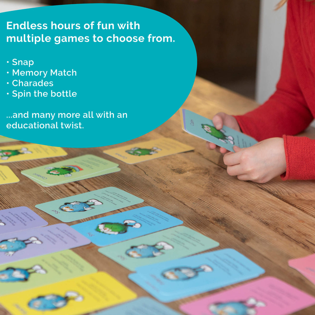 Child playing with educational card games on a wooden floor, with text about game options.